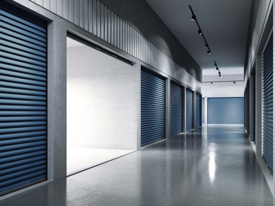 Storage facilities with blue doors. Opened door. Light inside.. 3d rendering