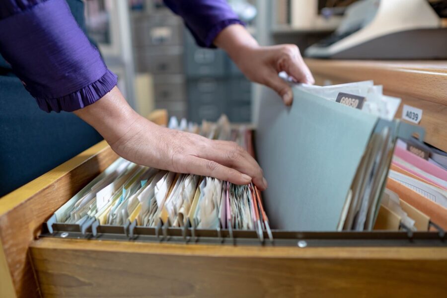 A person organizing records after long-distance moving