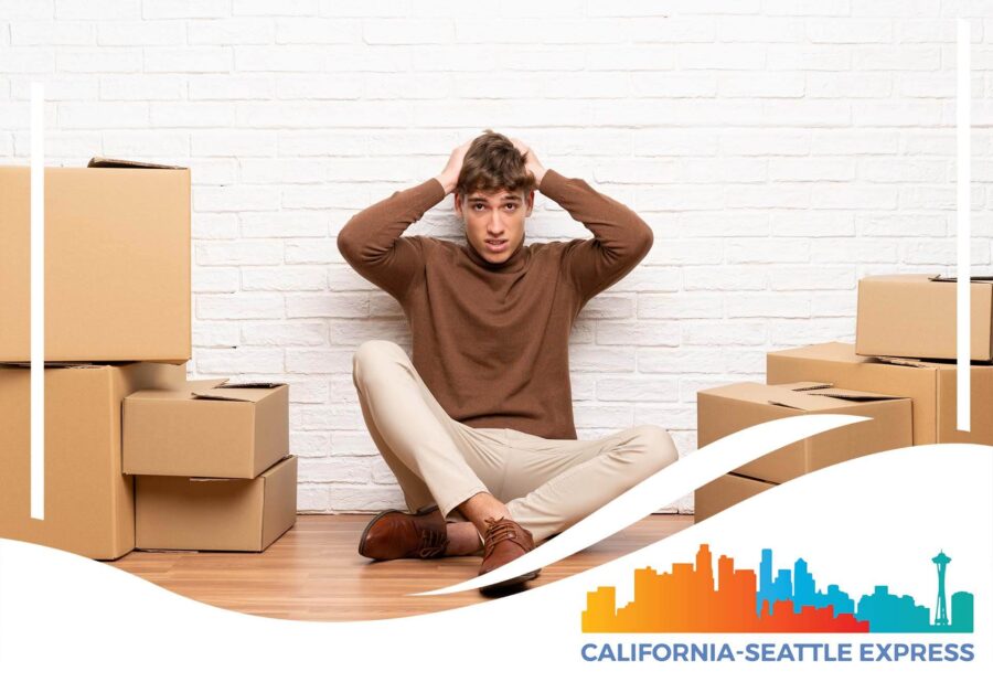 stressed person sitting on the floor California-Seattle Express logo