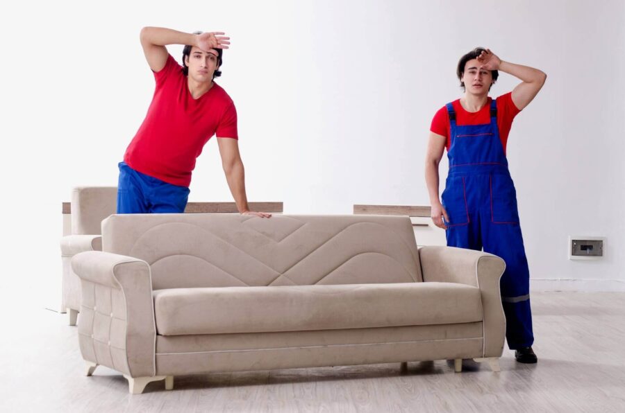 Cross-country movers packing furniture