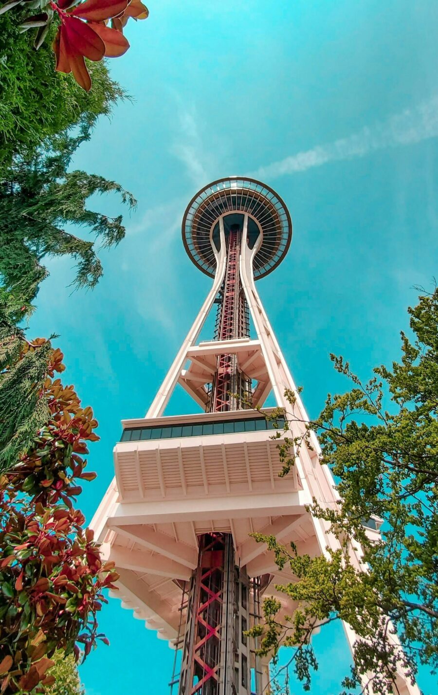A tall white tower standing against the sky in Seattle.